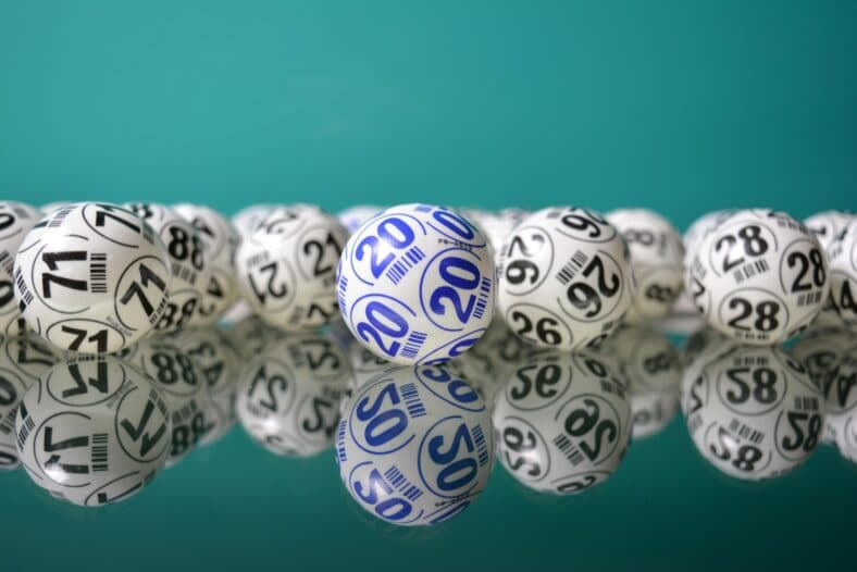 lottery balls on table / odd valentine traditions