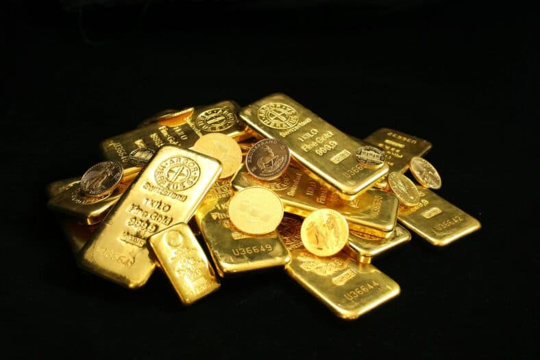 gold bars and coins black background