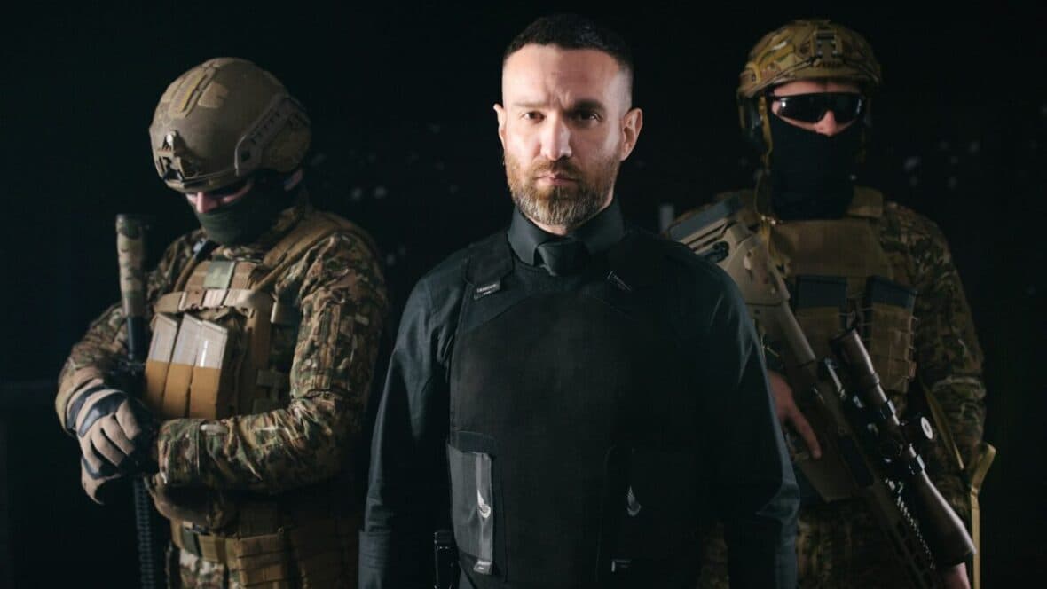 guy with bulletproof vest and military men