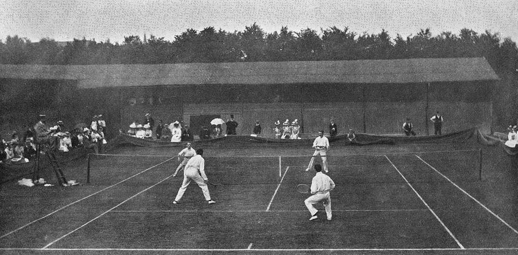 A photo from the 1897 Wimbledon tournament as it is oldest tennis tournament in the world, one of the historical facts about Wimbledon. 