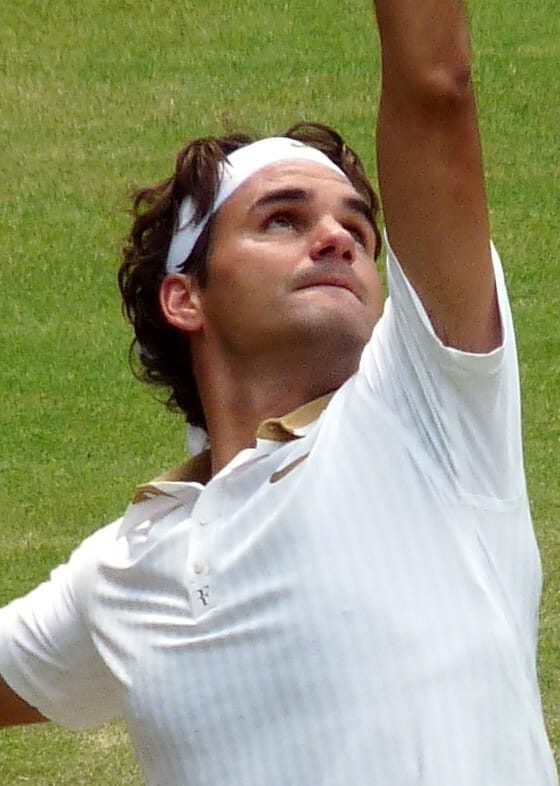 Roger Federer in all white, per Wimbledon's rules, one of the fun historical facts about Wimbledon. 