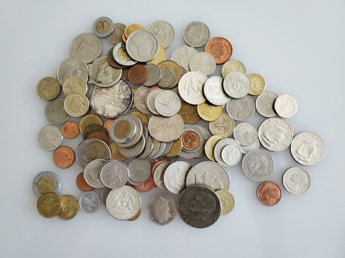 coins in a pile / heritage auctions