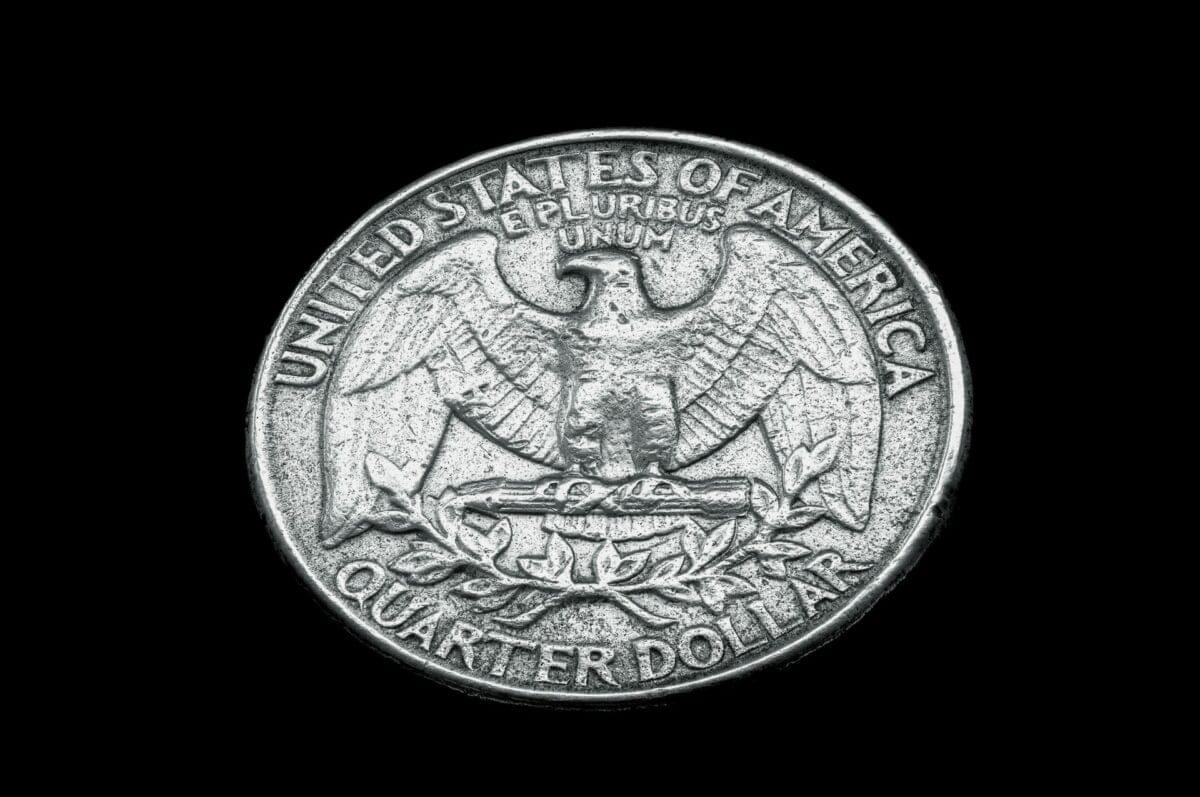 quarter on black background / rarest state quarters