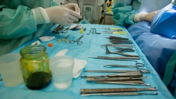 surgical tools laid out on table / civil war surgical tools