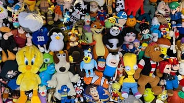wall of character stuffed animals / forgotten tv show collectibles