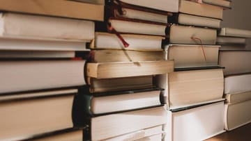 stacks of books / literature that influenced revolutions