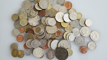 coins in a pile / heritage auctions
