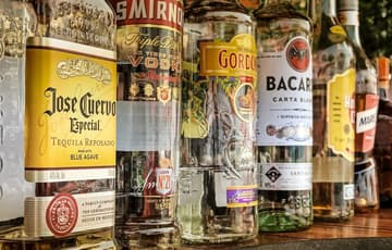alcohol bottles lined up / prohibition-era inventions