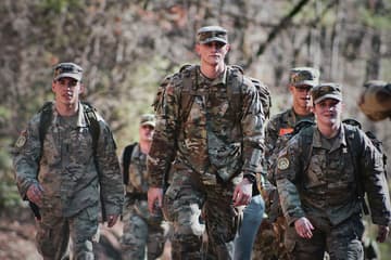 military men walking / strange military jobs