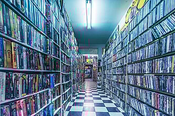 A collection of VHS tapes.