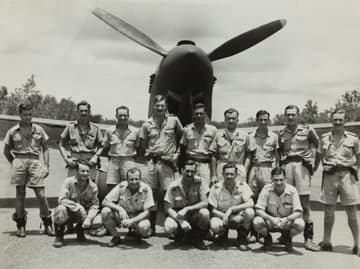 soldiers in front of plane / unsolved mysteries from world war ii