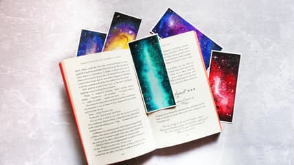 open book with space bookmarks / 1960s sci-fi paperbacks