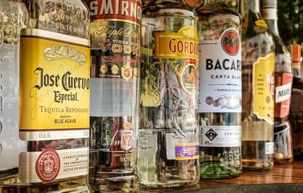 alcohol bottles lined up / prohibition-era inventions