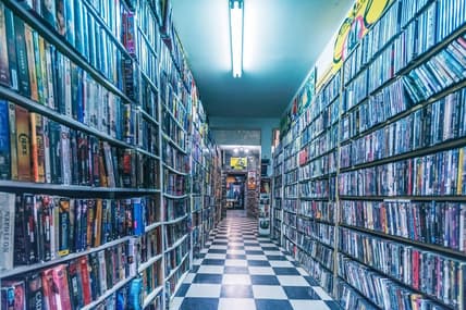 A collection of VHS tapes.
