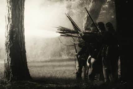 men shooting guns in the woods / civil war mysteries