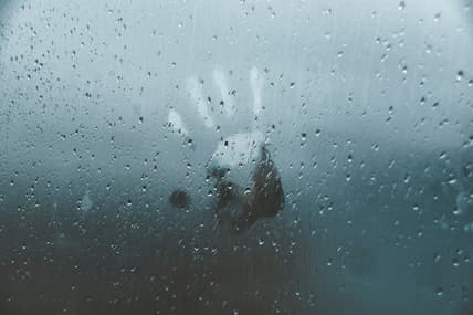 handprint on glass pane / strange disappearances