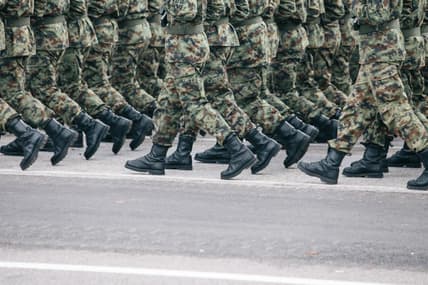 soldiers walking on pavement / deception tricks Allied forces used