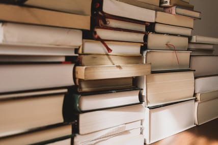 stacks of books / literature that influenced revolutions