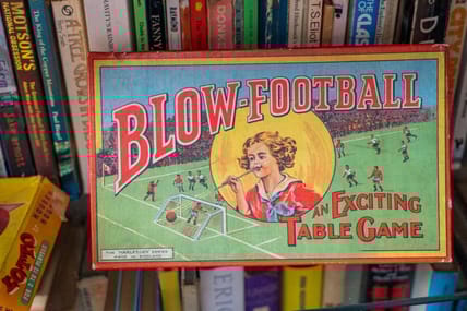 vintage sports game with books / sports memorabilia