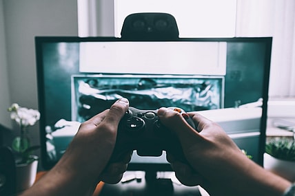 person playing video games / video game easter eggs