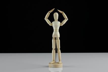 wooden human model posing / weird beliefs about the human body