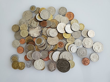 coins in a pile / heritage auctions