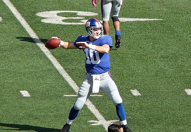 most valuable eli manning football cards