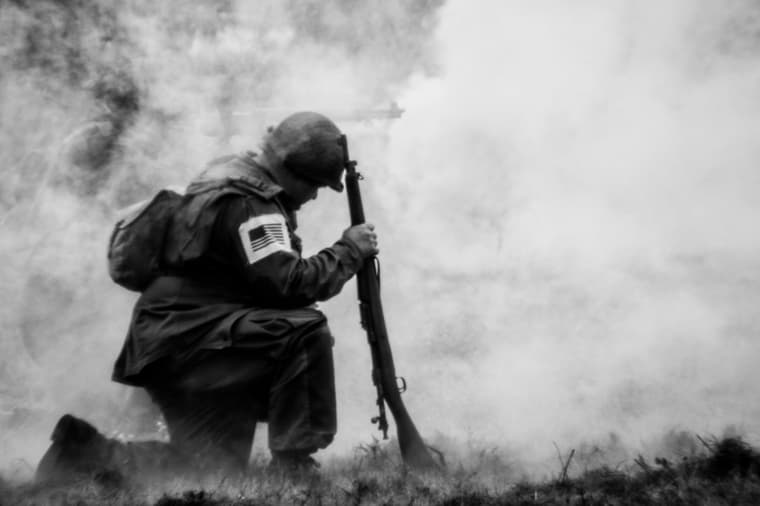 us soldier with gun / bizarre world war ii devices