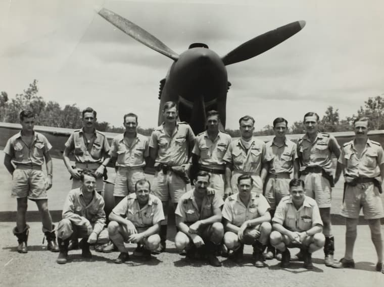 soldiers in front of plane / unsolved mysteries from world war ii