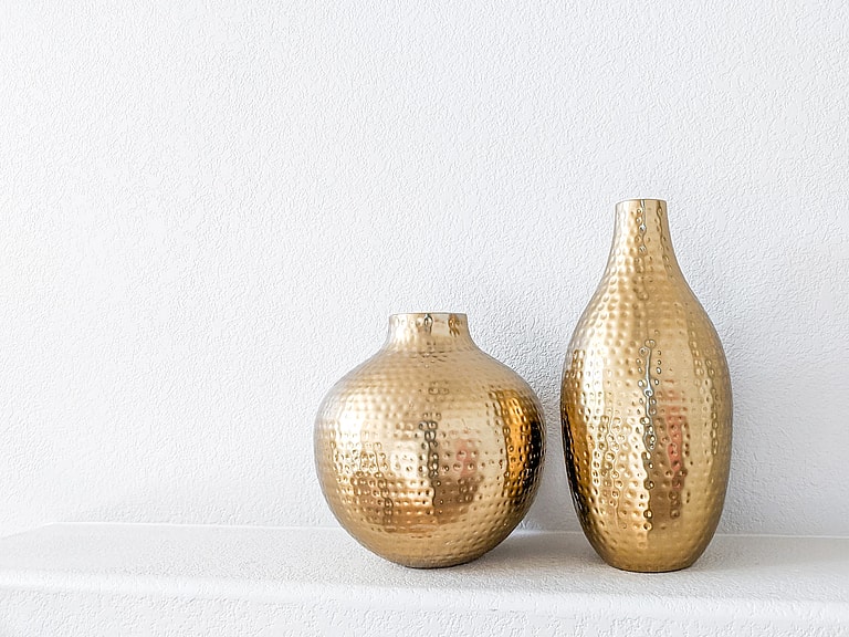unsplash, gold vase speckled vase