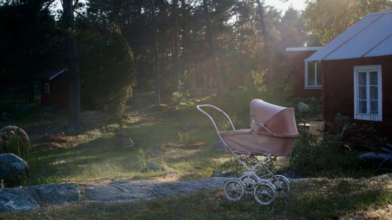 old pink baby carriage