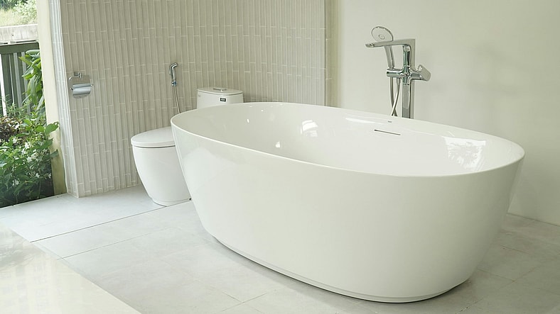 white bathtub in bathroom