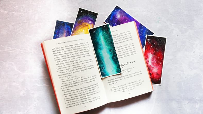 open book with space bookmarks / 1960s sci-fi paperbacks