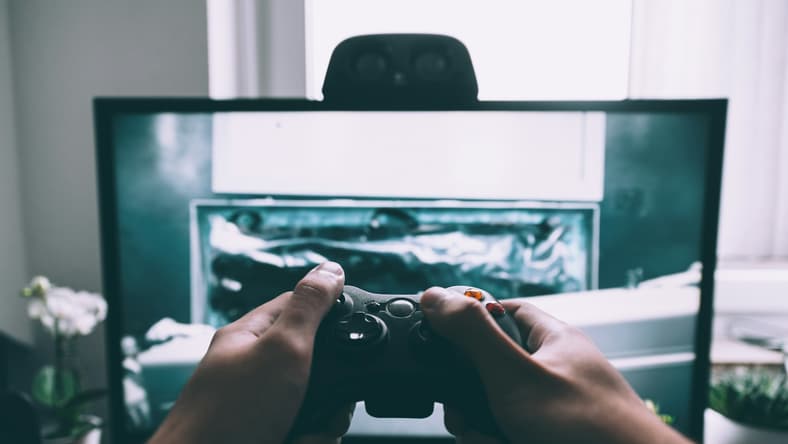 person playing video games / video game easter eggs