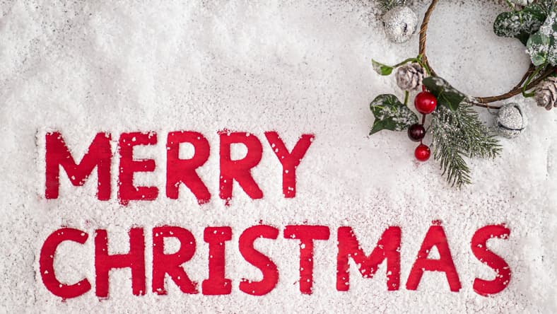 merry christmas sign in the snow / fun facts about Christmas