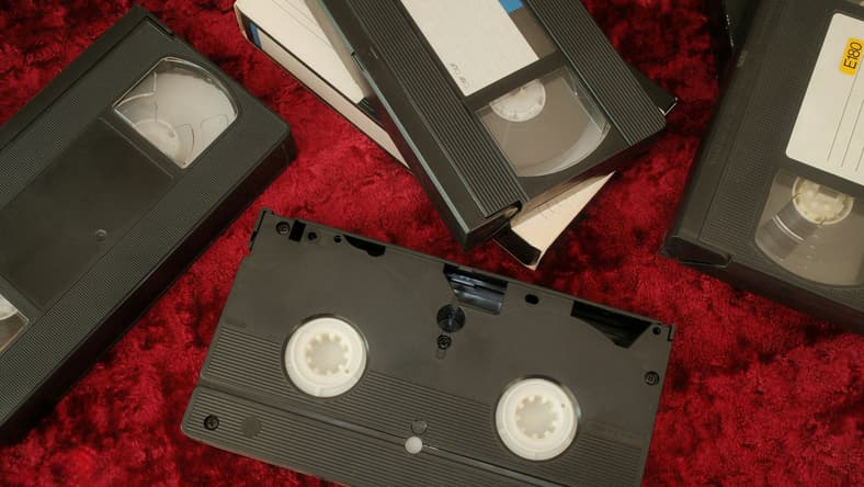 vhs tapes on red background / valuable christmas vhs tapes