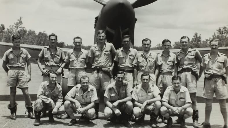 soldiers in front of plane / unsolved mysteries from world war ii