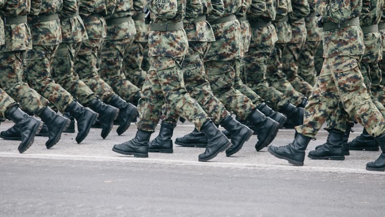 soldiers walking on pavement / deception tricks Allied forces used