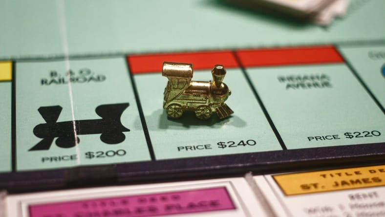 monopoly train piece on board / facts about monopoly