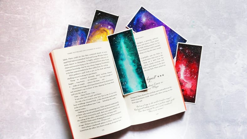 open book with space bookmarks / 1960s sci-fi paperbacks