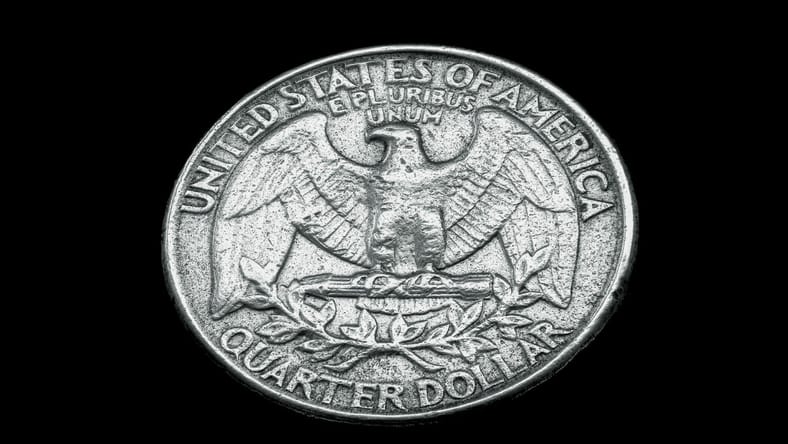 quarter on black background / rarest state quarters