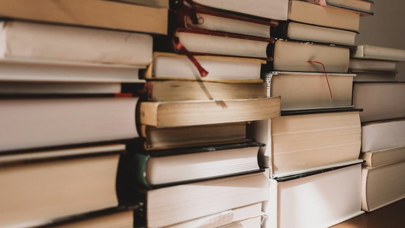 stacks of books / literature that influenced revolutions