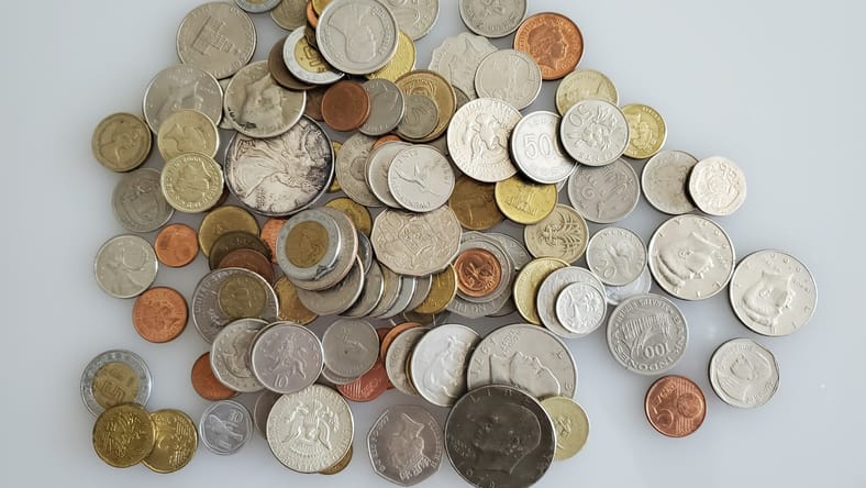 coins in a pile / heritage auctions