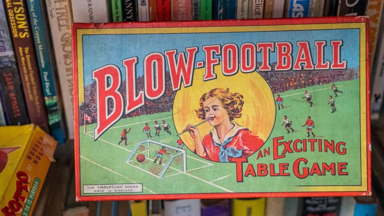 vintage sports game with books / sports memorabilia