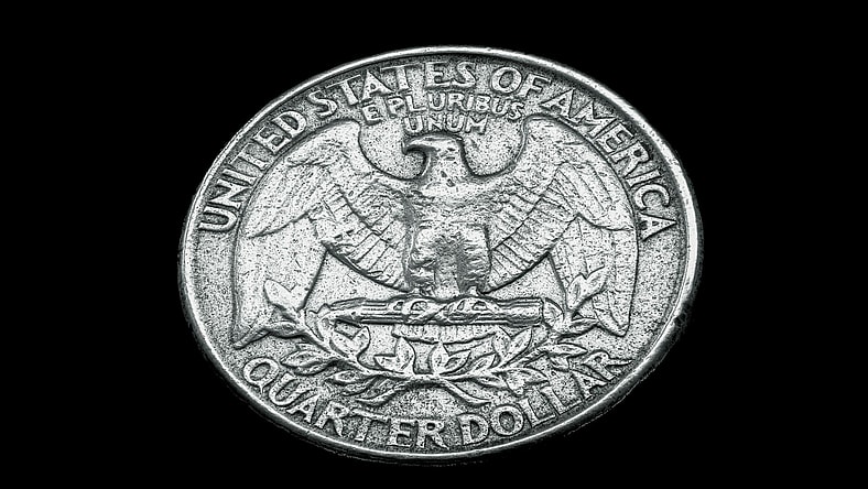 quarter on black background / rarest state quarters