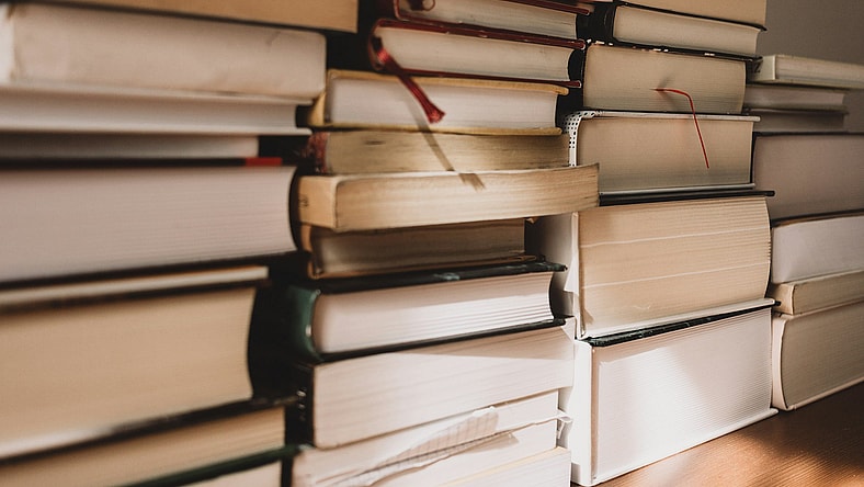 stacks of books / literature that influenced revolutions