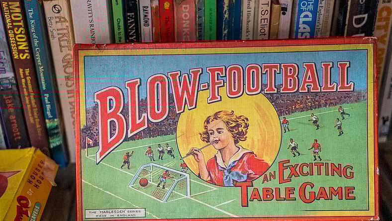 vintage sports game with books / sports memorabilia