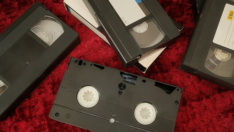 vhs tapes on red background / valuable christmas vhs tapes