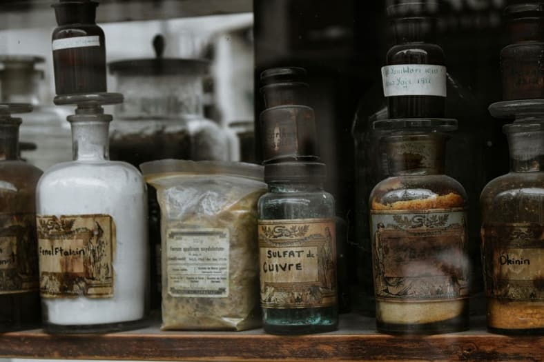 Antique bottles on shelf.