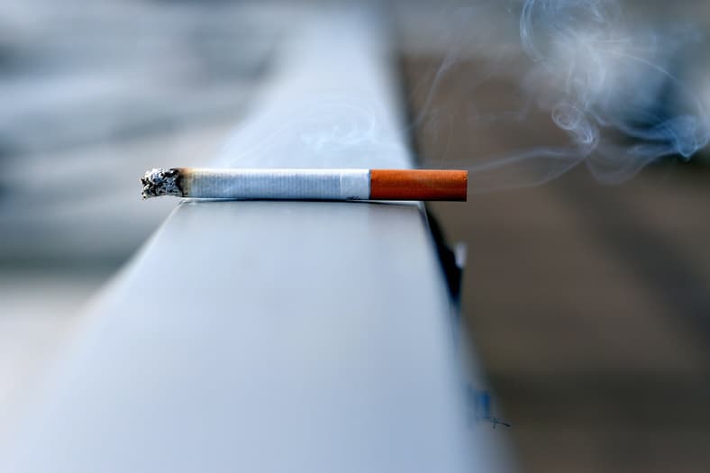 cigarette on railing